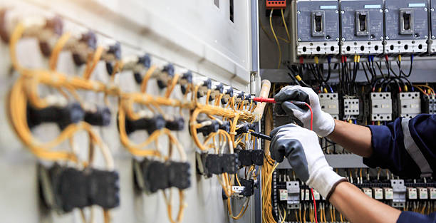 Professional Electrician technician working in Limestone Creek, FL